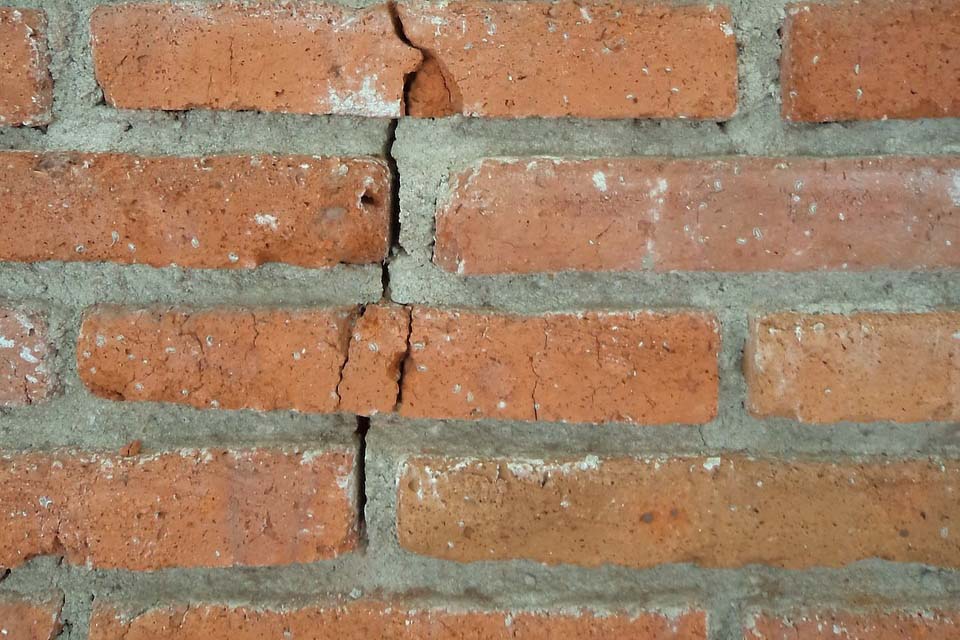 brick wall with vertical crack